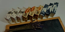 Load image into Gallery viewer, MIXED SET OF THREE SOAPS. LAVENDER PEPPERMINT CAMPER. CHARCOAL ACTIVATED. ORANGE BLOSSOM.