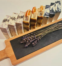 Load image into Gallery viewer, MIXED SET OF THREE SOAPS. LAVENDER PEPPERMINT CAMPER. CHARCOAL ACTIVATED. ORANGE BLOSSOM.

